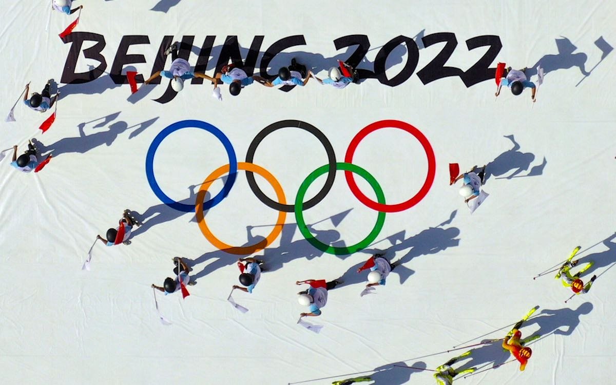 The photo shows a skiing display against the backdrop of the 2022 Winter Olympics logo as part of China’s publicity campaign.