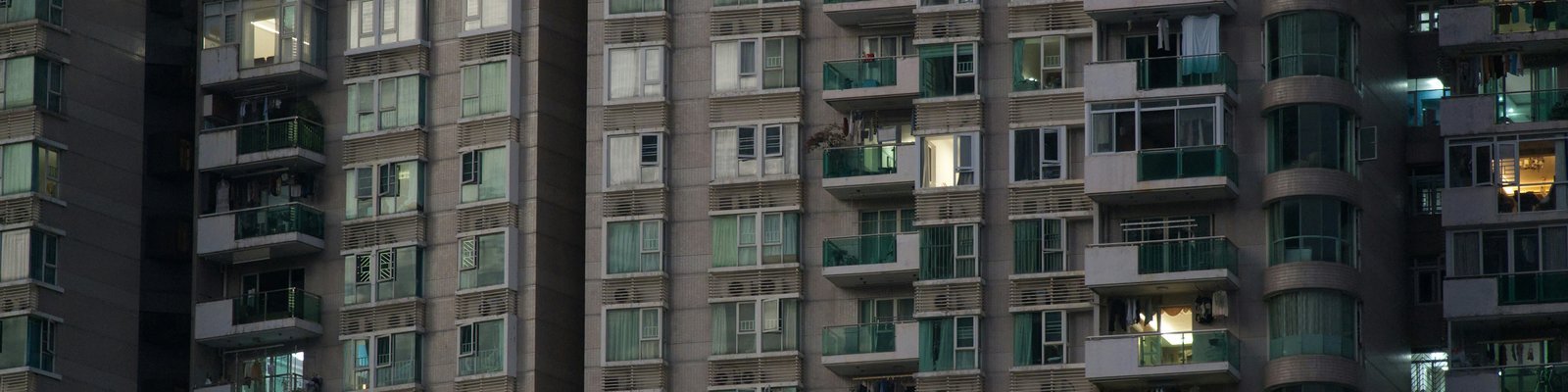 High-rise apartment buildings in China at night
